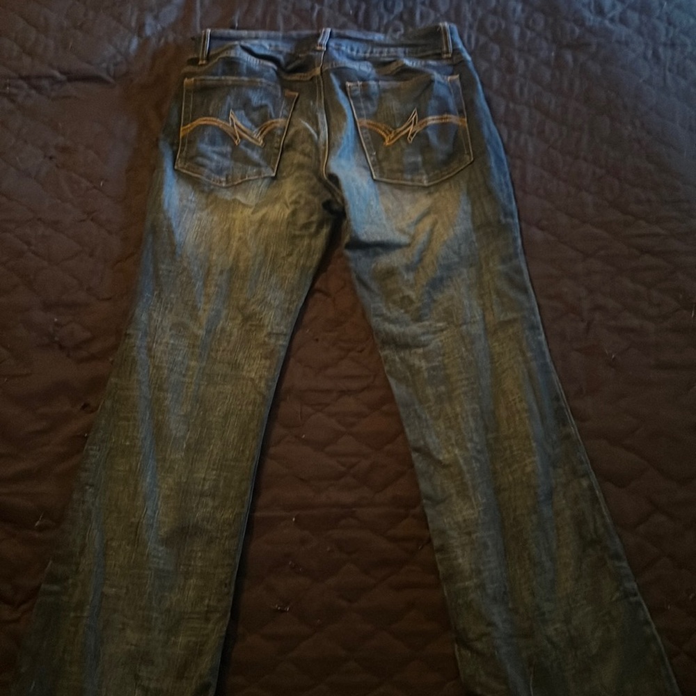 Woman’s wrangler boot cut jeans great condition very comfortable! Size 9x30